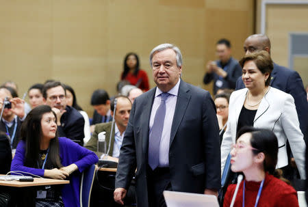 U.N. Secretary General Antonio Guterres and executive secretary of the U.N. Framework Convention on Climate Change Patricia Espinosa arrive for a meeting with representatives of various NGO organisations before the final session of the COP24 U.N. Climate Change Conference 2018 in Katowice, Poland, December 14, 2018. REUTERS/Kacper Pempel