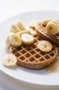 <p>Toast a 100% whole-grain frozen waffle and spread 2 tablespoons <a href="https://www.goodhousekeeping.com/health/diet-nutrition/a19503705/almonds-nutrition/" rel="nofollow noopener" target="_blank" data-ylk="slk:nut butter;elm:context_link;itc:0;sec:content-canvas" class="link ">nut butter</a> on top. Add 1 small sliced banana plus cinnamon and nutmeg. Serve with 8 ounces fat-free milk.</p>