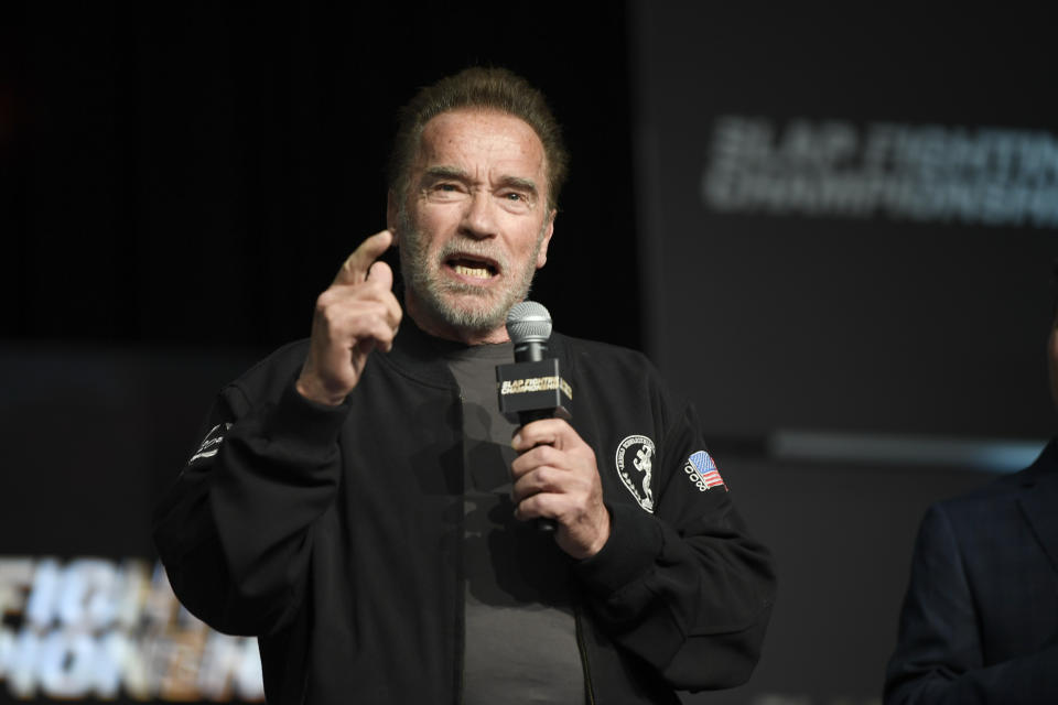 COLUMBUS, OHIO - MARCH 05:  Arnold Schwarzenegger speaks to fans during the Slap Fighting Championships at the Arnold Sports Festival in Columbus Convention Center on March 05, 2022 in Columbus, Ohio. (Photo by Gaelen Morse/Getty Images)