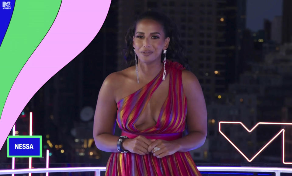 In this video grab issued Sunday, Aug. 30, 2020, by MTV, host Nessa, wearing earrings with the name Breonna Taylor, speaks prior to the start of the MTV Video Music Awards. (MTV via AP)