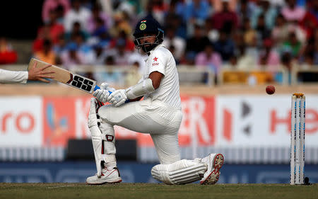 India's Murali Vijay plays a shot. REUTERS/Adnan Abidi