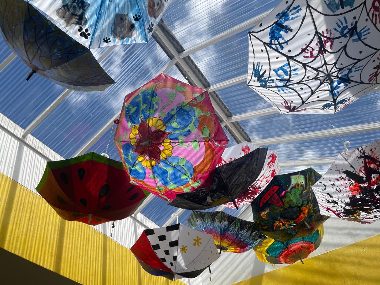 Umbrellas hanging from a skylight at the Riverview Plaza on May 8, 2024. The St. Clair Art Association hung these umbrellas as part of its grand reopening, which will take place on May 19.