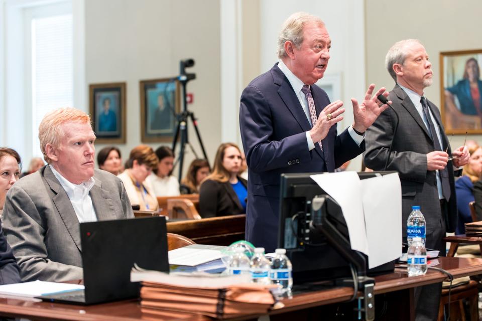 Alex Murdaugh, left, listens as defense attorney Dick Harpootlian, center, and prosecutor Creighton Waters discuss whether to delay the trial due to jurors infected with Covid, with Judge Clifton Newman during day 16 of his double murder trial at the Colleton County Courthouse on Monday, February 13, 2023.  Jeff Blake/The State/Pool