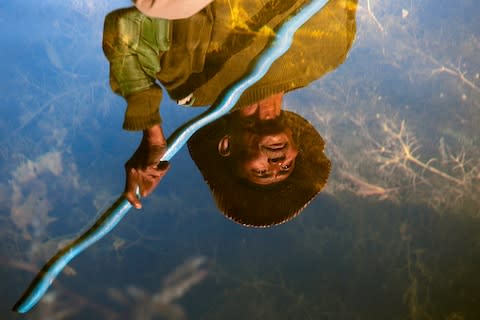 A fisherman on Inle Lake - Credit: steve mccurry