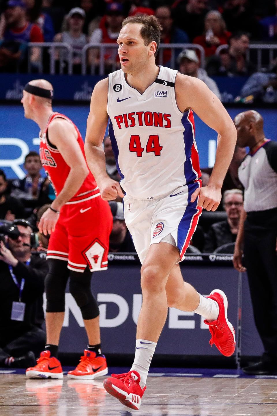 Pistons forward Bojan Bogdanovic runs back after scoring against Bulls during the first half on Wednesday, March 1, 2023, at Little Caesars Arena.