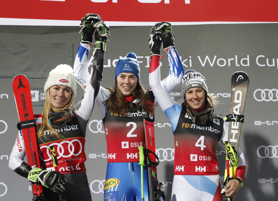 Slovakia's Petra Vlahova, center, winner of an alpine ski, women's World Cup parallel slalom, poses on the podium with second placed Mikaela Shiffrin, of the United States, left, and third placed Switzerlands' Wendy Holdener at Holmenkollen in Oslo, Norway, Tuesday, Jan. 1, 2019. (Terje Bendiksby/NTB scanpix via AP)