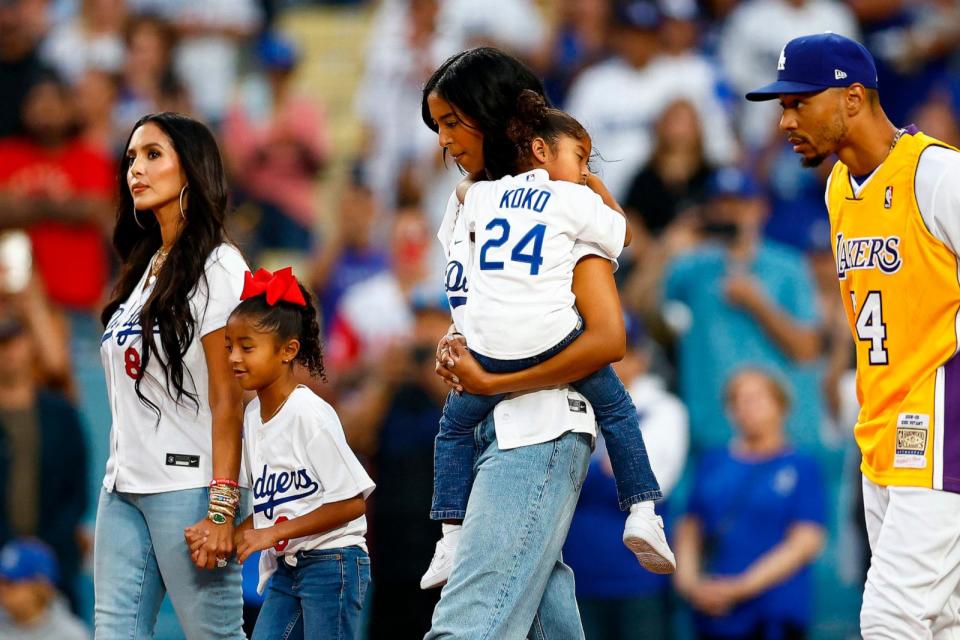 PHOTO: Vanessa Bryant, Bianka Bryant, Natalia Bryant, Capri Bryant and Mookie Betts before a game between the Atlanta Braves and the Los Angeles Dodgers on 'Lakers Night' at Dodger Stadium on Sept. 1, 2023 in Los Angeles. (Ronald Martinez/Getty Images)