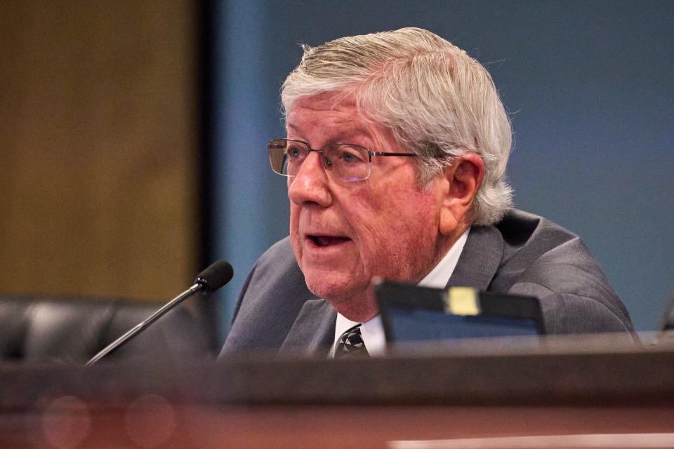 Commissioner Jim O'Connor asks a question as members of the public address the Arizona Corporation Commission during a public comment meeting at the Arizona Corporation Commission in Phoenix on Jan. 23, 2023.