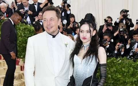 Elon Musk and Grimes, pictured at The Metropolitan Museum of Art last year - Credit: Getty&nbsp;