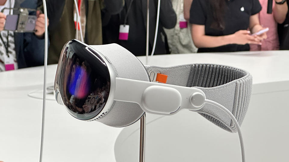 The Apple Vision Pro headset on a stand at WWDC 2023