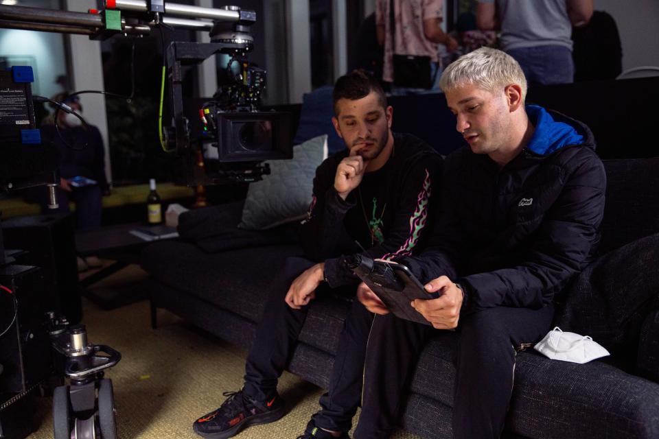 Australian brothers Michael (left) and Danny Philippou go over a scene on the set of their directorial debut "Talk to Me."