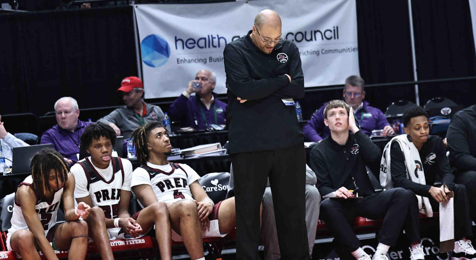 Harvest Prep coach David Dennis Sr. reacts during the Division III state championship game against Cleveland Heights Lutheran East on Sunday at University of Dayton Arena.