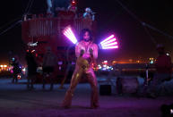 <p>Members of the Scintillating Fire Circus perform as approximately 70,000 people from all over the world gathered for the annual Burning Man arts and music festival in the Black Rock Desert of Nevada, Aug. 31, 2017. (Photo: Jim Urquhart/Reuters) </p>