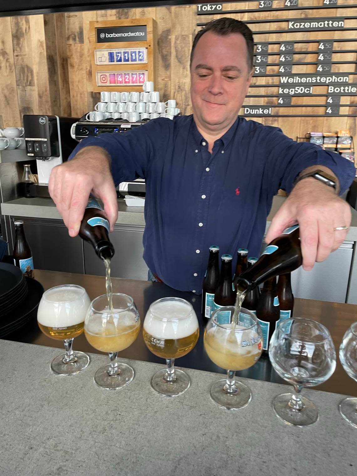 Marco Passarella. sales & marketing manager at Brouwerij St.Bernardus, pours beers during a private tour.