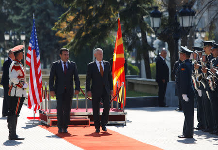 Macedonian Prime Minister Zoran Zaev and U.S. Secretary of Defense James Mattis attend a welcoming ceremony in Skopje, Macedonia September 17, 2018. REUTERS/Ognen Teofilovski