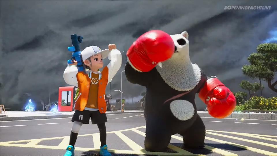 DokeV panda monster wearing red boxing gloves stands next to a cheering trainer