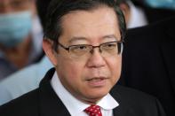 Malaysia's former finance minister Lim Guan Eng speaks during a news conference outside Kuala Lumpur High Court in Kuala Lumpur