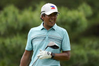 Juvic Pagunsan, of the Philippines, watches his shot from the 12th tee during the first round for the men's golf event at the 2020 Summer Olympics, Thursday, July 29, 2021, at the Kasumigaseki Country Club in Kawagoe, Japan, (AP Photo/Matt York)