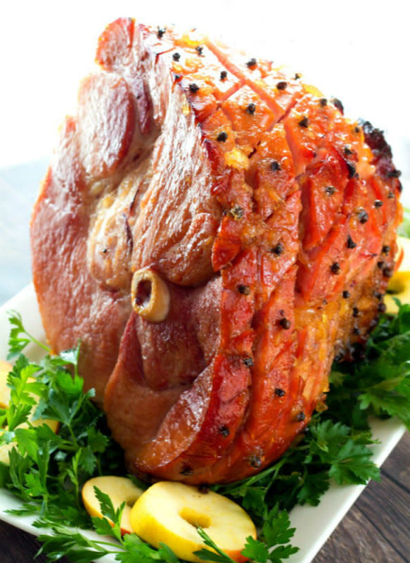 <p>Melissa's Southern Style Kitchen</p><p>This kicked-up Brown Sugar Bourbon Pineapple Glazed Ham is packed with sweet and spicy flavors. </p><p><strong>Get the recipe: <a href="http://www.melissassouthernstylekitchen.com/brown-sugar-bourbon-pineapple-glazed-ham/" rel="nofollow noopener" target="_blank" data-ylk="slk:Brown Sugar Bourbon Pineapple Glazed Ham;elm:context_link;itc:0;sec:content-canvas" class="link ">Brown Sugar Bourbon Pineapple Glazed Ham</a></strong></p>