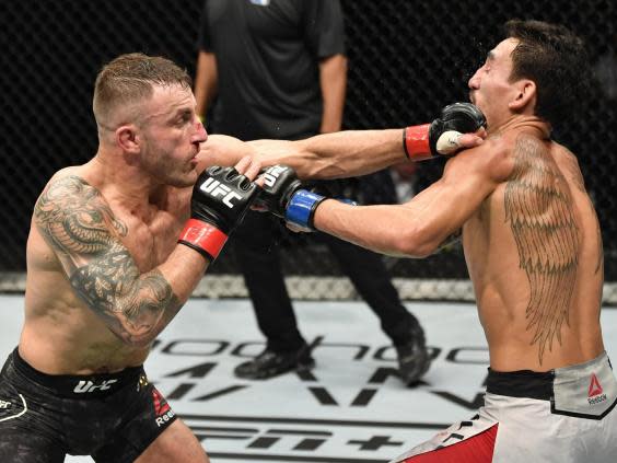 Volkanovski (left) beat Holloway for a second time (Zuffa LLC via Getty Images)