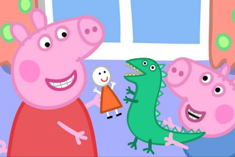 Peppa junto a su hermanito George, que probablemente esté diciendo: "Dinosaurio, grrrr"