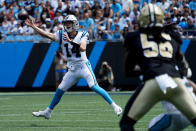 Carolina Panthers quarterback Sam Darnold passes against the New Orleans Saints during the first half of an NFL football game Sunday, Sept. 19, 2021, in Charlotte, N.C. (AP Photo/Jacob Kupferman)