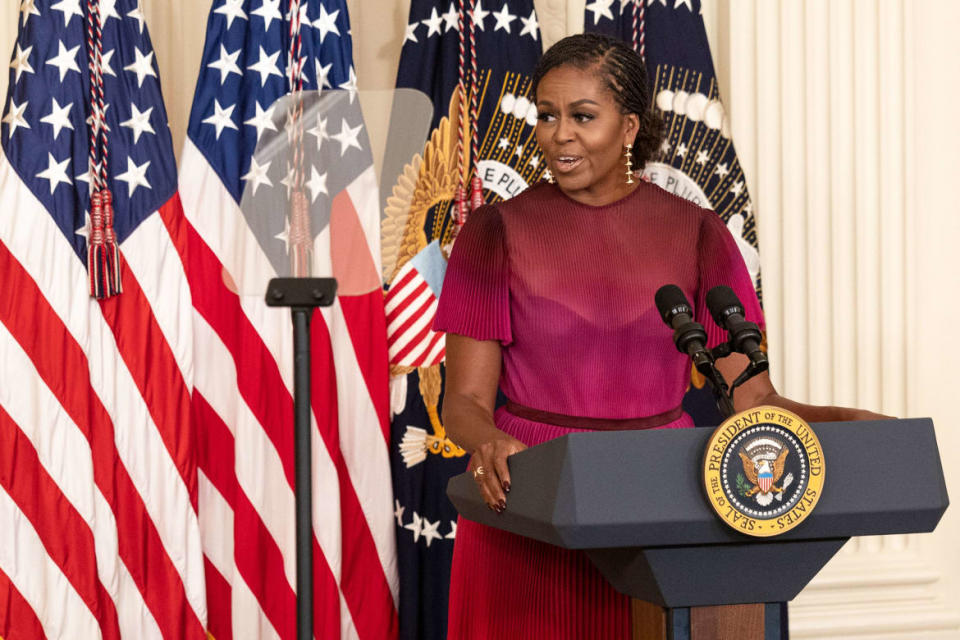 Michelle Obama delivers a speech in the White House