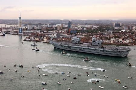The Royal Navy's new aircraft carrier, HMS Queen Elizabeth, arrives in Portsmouth, Britain August 16, 2017. LPhot Dan Rosenbaum/Royal Navy/MoD/Crown Copyright/Handout via REUTERS