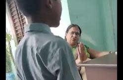 An image from a video that went viral in India and was verified by Indian police in Uttar Pradesh state shows teacher Tripta Tyagi at the   Neha Public School seated as she tells other students to come up and hit a young Muslim student, seen in the foreground, on August 24, 2023. 