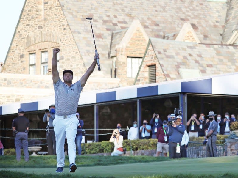 Bryson DeChambeau celebrates on the 18th green at Winged Foot (Getty Images)