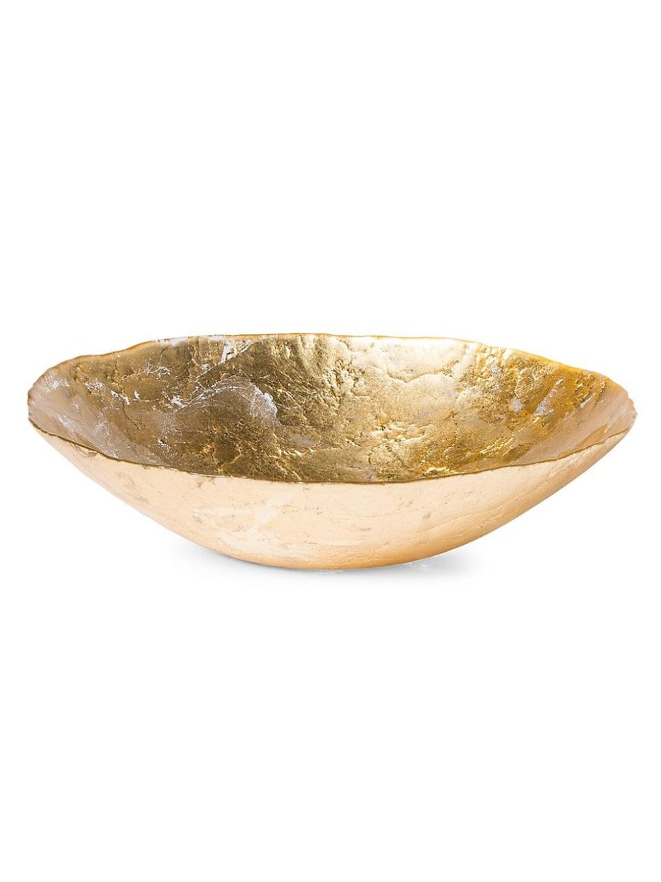 <p><a href="https://go.redirectingat.com?id=74968X1596630&url=https%3A%2F%2Fwww.saksfifthavenue.com%2Fproduct%2Fvietri-moon-glass-medium-bowl-0400097944698.html&sref=https%3A%2F%2Fwww.housebeautiful.com%2Flifestyle%2Ffun-at-home%2Fa60674907%2Ftan-france-favorite-products%2F" rel="nofollow noopener" target="_blank" data-ylk="slk:Shop Now;elm:context_link;itc:0;sec:content-canvas" class="link ">Shop Now</a></p><p>Moon Glass Medium Bowl</p><p>saksfifthavenue.com</p><p>$89.00</p>