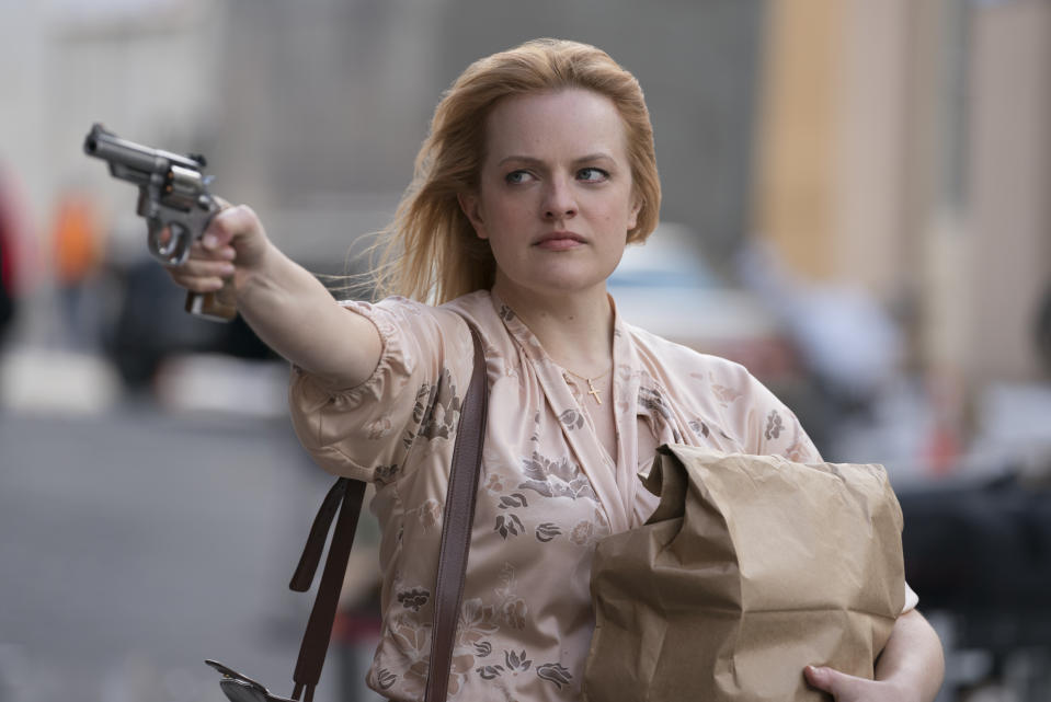 This image released by Warner Bros. Pictures shows Elisabeth Moss in a scene from "The Kitchen." (Alison Cohen Rosa/Warner Bros. Pictures via AP)