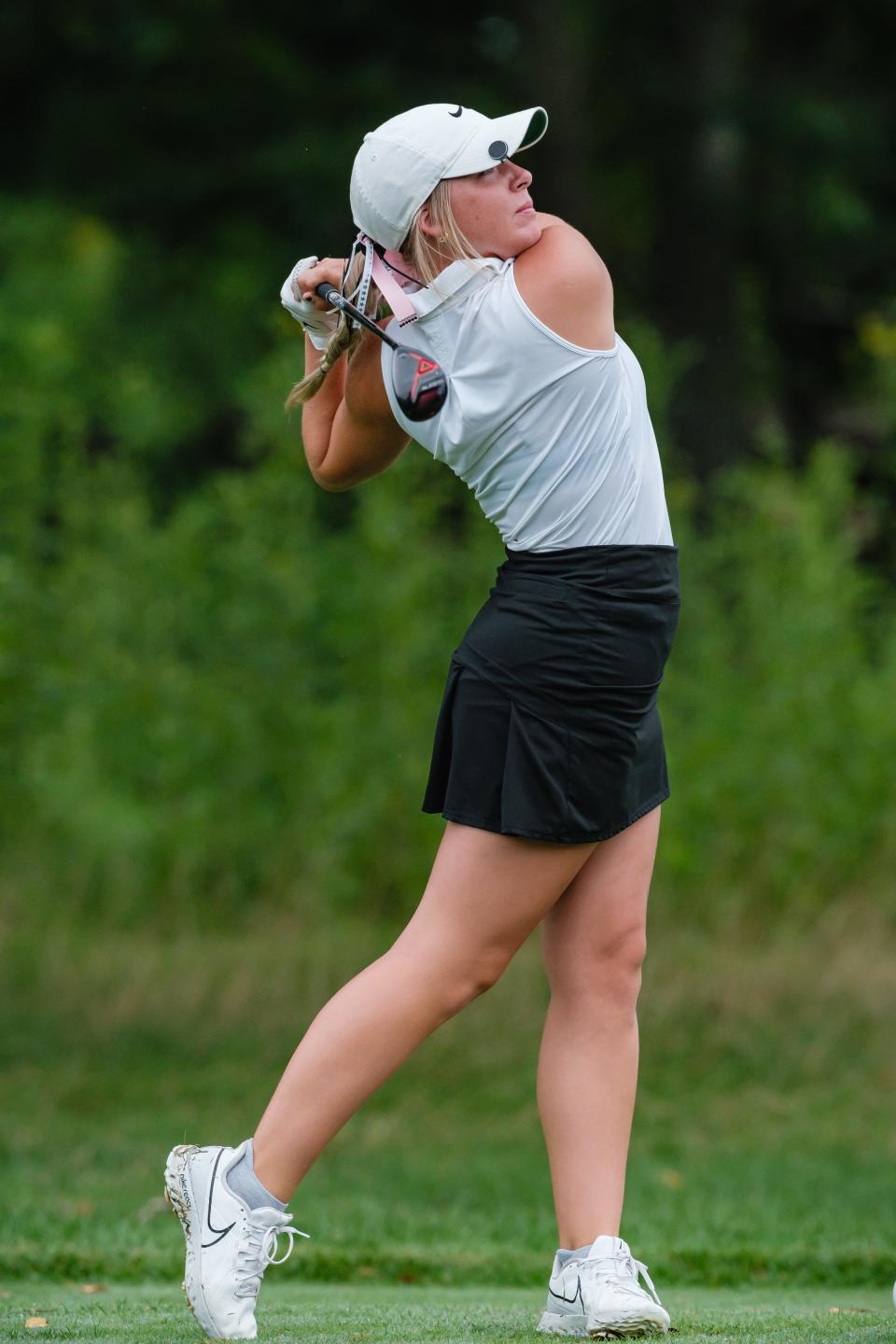 Carrollton's Ashlee Garner shot 75 to earn medalist honors and help the Warriors break an 18-hole scoring record at the Tri-Valley Lady Dawg Invitational.