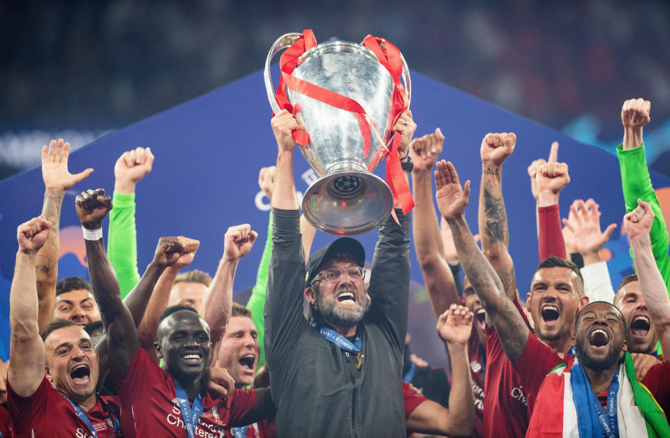 Jurgen Klopp celebrates with the Champions League Trophy. (Credit: Getty Images)