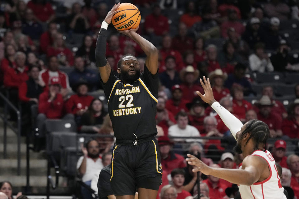 Northern Kentucky guard Trevon Faulkner (22) shoots over a Houston defender during the first half of a first-round college basketball game in the men's NCAA Tournament in Birmingham, Ala., Thursday, March 16, 2023. (AP Photo/Rogelio V. Solis)