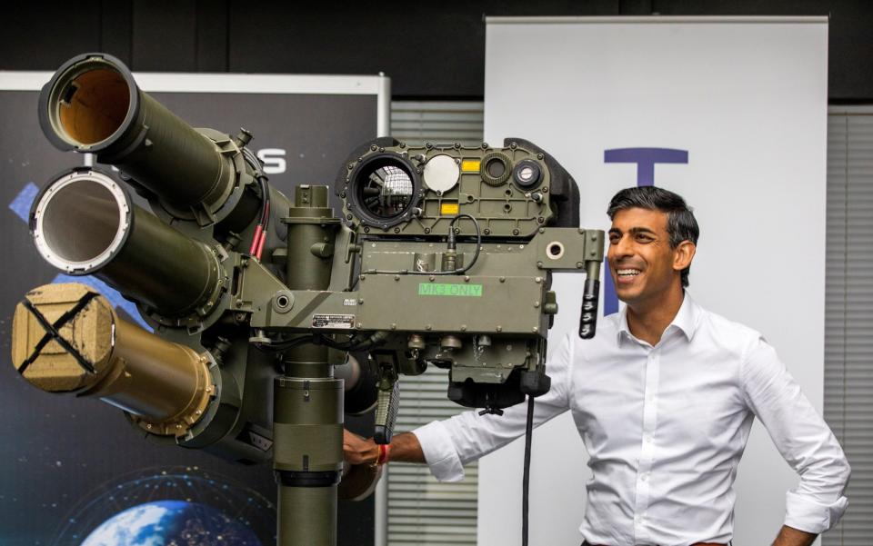 Rishi Sunak reacts during a visit to the Thales Defence System plant in Belfast - Getty Images Europe