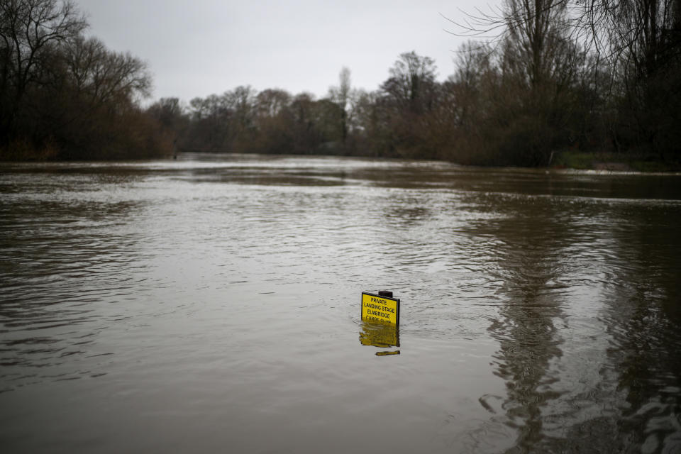 A partly submerged sign in Weybridge, Surrey, after Storm Christoph caused widespread flooding across the UK. Picture date: Monday February 1, 2021.