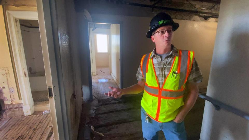 Brian Herring, superintendent of construction for Freeman & Associates on the renovation of The Ralston in Columbus, Georgia, talks about the challenges of the project while giving a tour of a yet-to-be renovated upper floor.