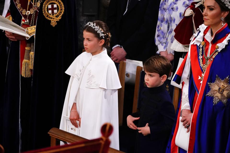 london, england may 06 britain's princess charlotte, prince louis and catherine, princess of wales at the coronation ceremony of king charles iii and queen camilla in westminster abbey on may 6, 2023 in london, england the coronation of charles iii and his wife, camilla, as king and queen of the united kingdom of great britain and northern ireland, and the other commonwealth realms takes place at westminster abbey today charles acceded to the throne on 8 september 2022, upon the death of his mother, elizabeth ii photo by yui mok wpa poolgetty images