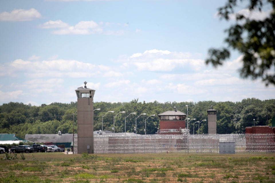 Image: A guard tower sits along a security fence at the Federal Correctional Complex where Daniel Lewis Lee is scheduled to be executed on July 13, 2020 in Terre Haute, Indiana. (Scott Olson / Getty Images)