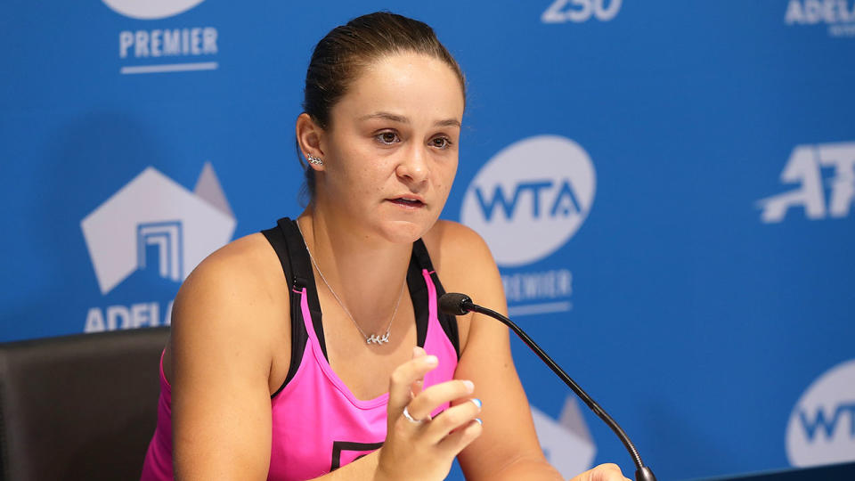 Seen here, Ash Barty talks with reporters during a press conference.