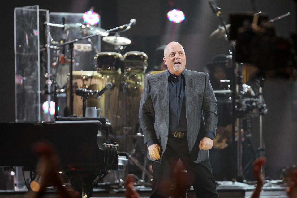 This image released by Starpix shows Billy Joel at the 12-12-12 The Concert for Sandy Relief at Madison Square Garden in New York on Wednesday, Dec. 12, 2012. Proceeds from the show will be distributed through the Robin Hood Foundation. (AP Photo/Starpix, Dave Allocca)