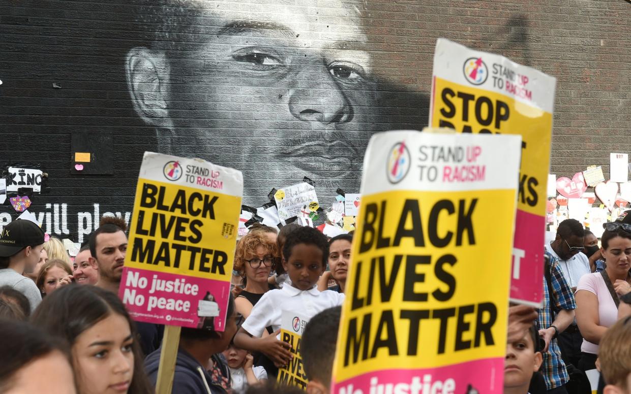 Stand Up to Racism Demonstration at the Marcus Rashford mural after it was defaced following the Euro 2020 Final between Italy and England - Peter Powell/Reuters