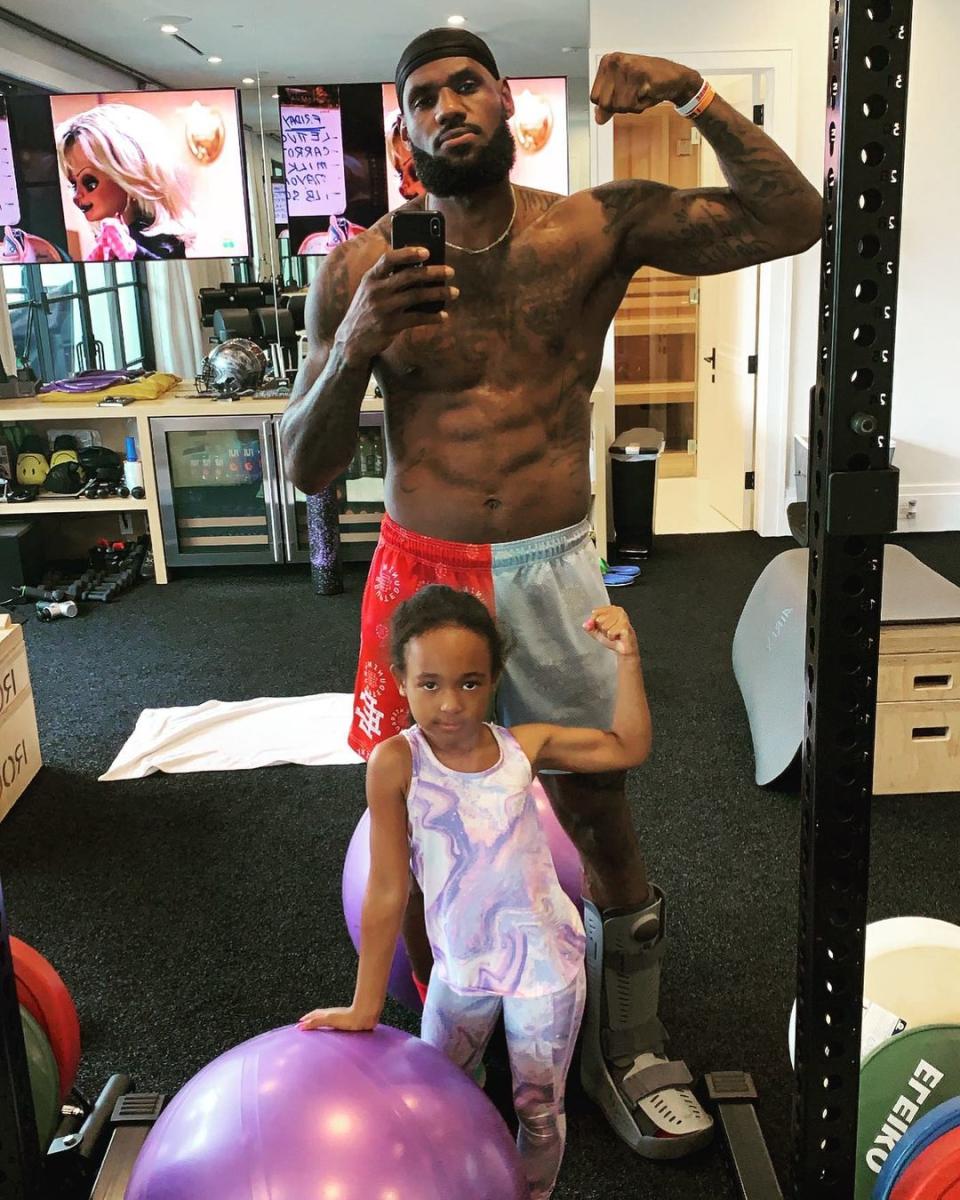 <p>The NBA champ and his six-year-old daughter Zhuri showed off their muscles after spending time in their home gym. "My workout partner today!" <a href="https://www.instagram.com/p/CNIuHU_htBq/" rel="nofollow noopener" target="_blank" data-ylk="slk:wrote the basketball player;elm:context_link;itc:0;sec:content-canvas" class="link ">wrote the basketball player</a>, adding the hashtag "#JamesGang." </p>