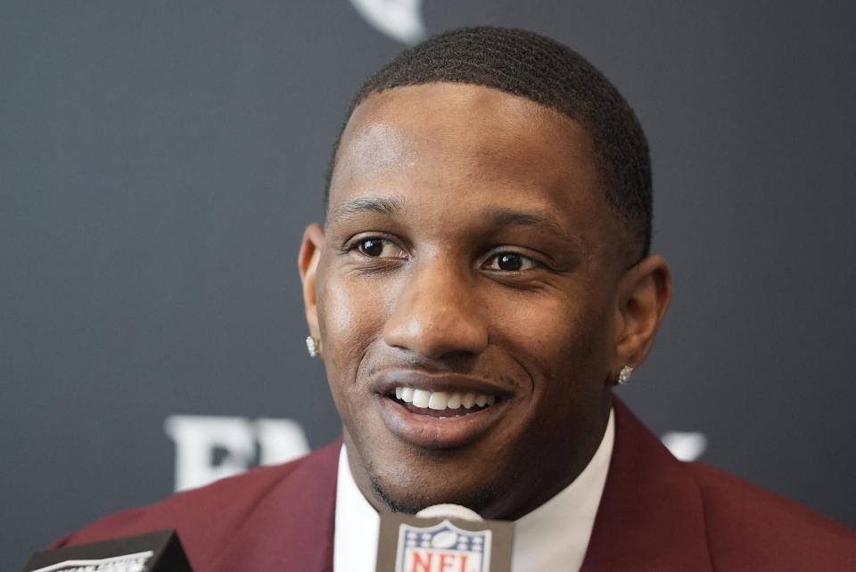 Atlanta Falcons first round draft choice quarterback Michael Penix Jr., speaks during a news conference Friday, April 26, 2024, in Flowery Branch, Ga. (AP Photo/John Bazemore)