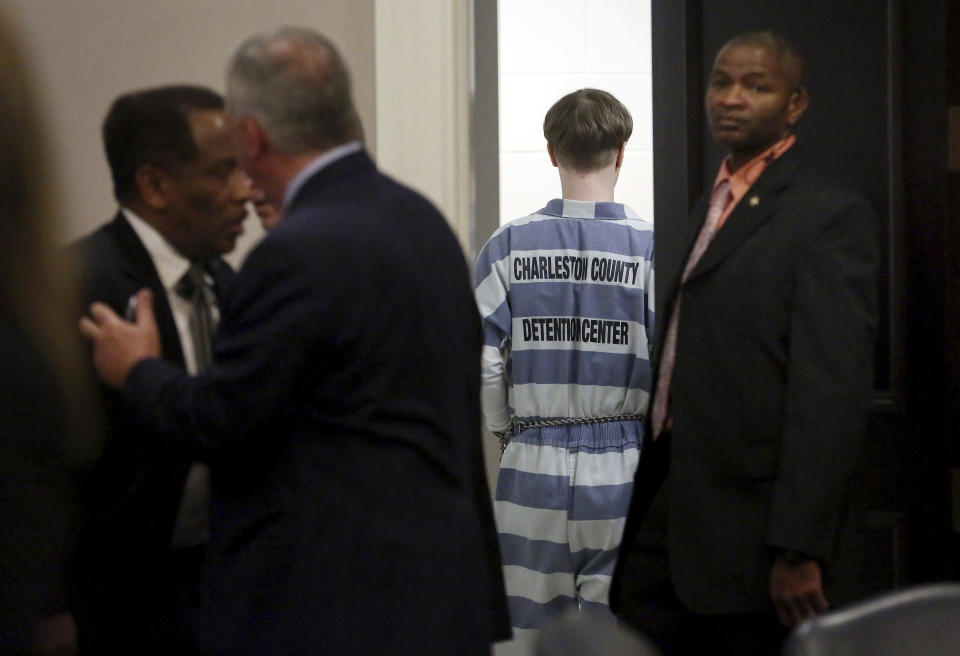 Dylann Roof leaves the Charleston County Court Monday April 10, 2017 after he pleaded guilty to nine murder charges from the shooting at Emanuel AME in Charleston, S.C. The convicted Charleston church shooter, Roof was given nine consecutive life sentences in state prison after he pleaded guilty to state murder charges Monday, leaving him to await execution in a federal prison and sparing his victims and their families the burden of a second trial. (Grace Beahm/The Post And Courier via AP, Pool)