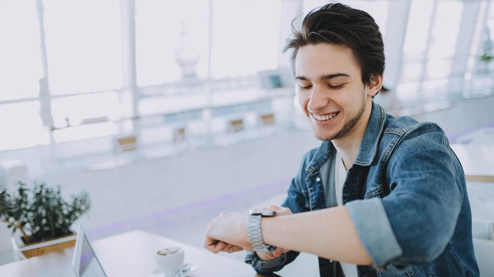 man checking his watch