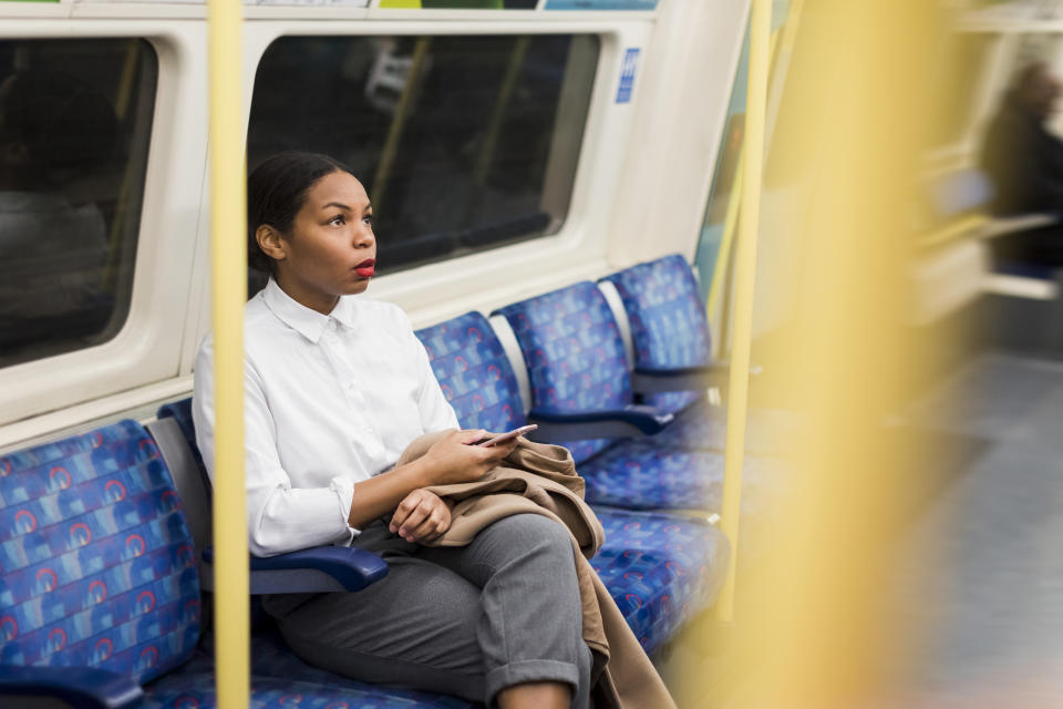 Woman on public transport. (Getty Images)