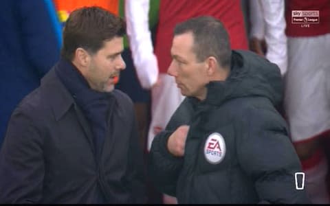 Poch bends an ear - Credit: Sky Sports Premier League