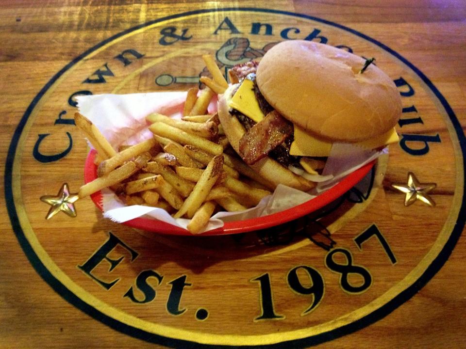 The Crown & Anchor Pub near the University of Texas has been making classic burgers since 1987.